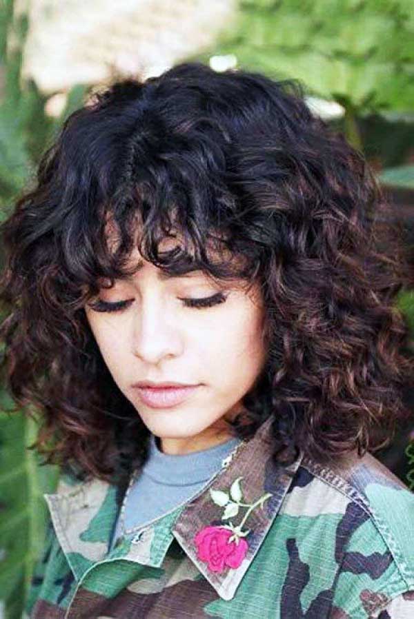 layered-curly-hair-with-bangs