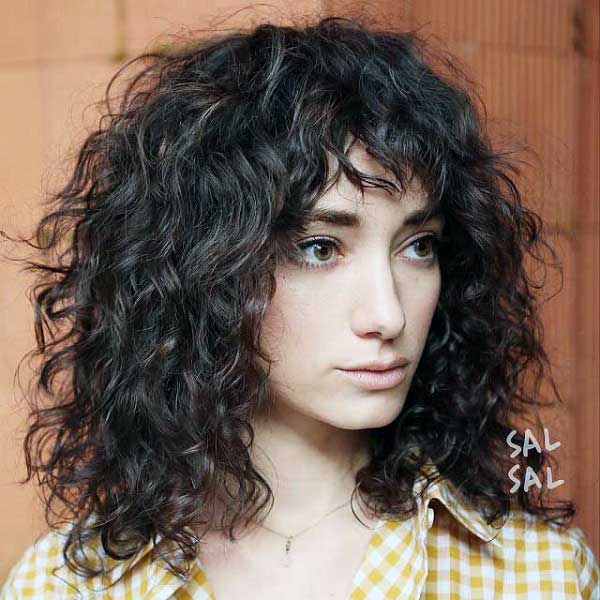 medium-curly-hair-with-bangs