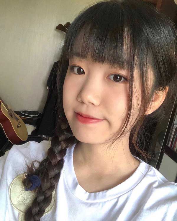 medium-hair-pigtails-with-bangs