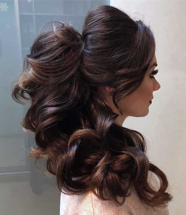 curly-ponytail-with-bangs 