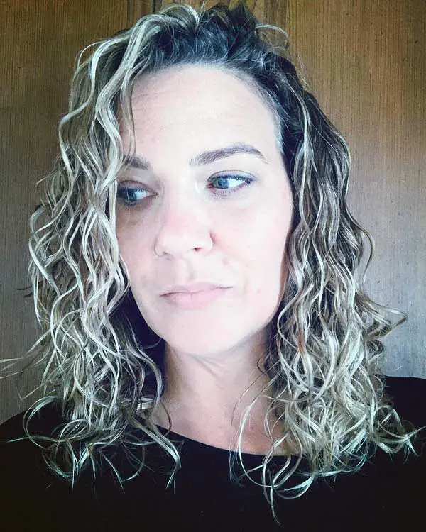 layered-curly-hair-for-over-50