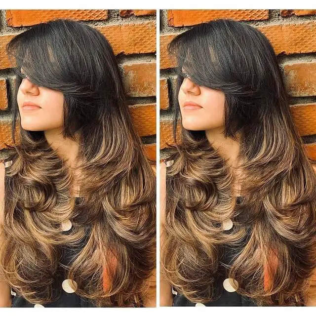 long layered hair with side swept bangs