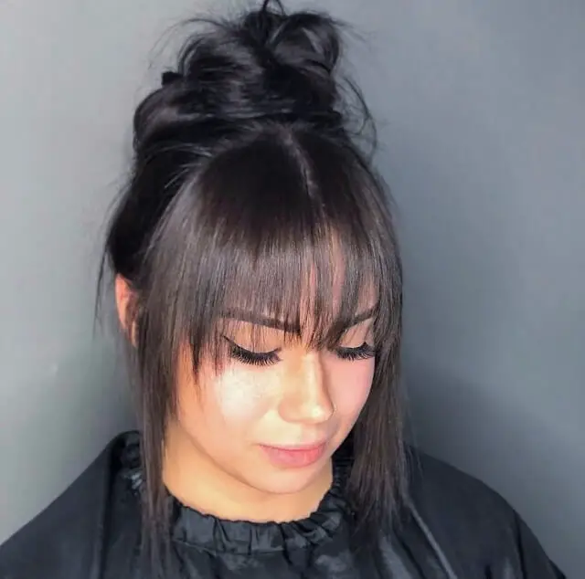 wispy bangs for round face 