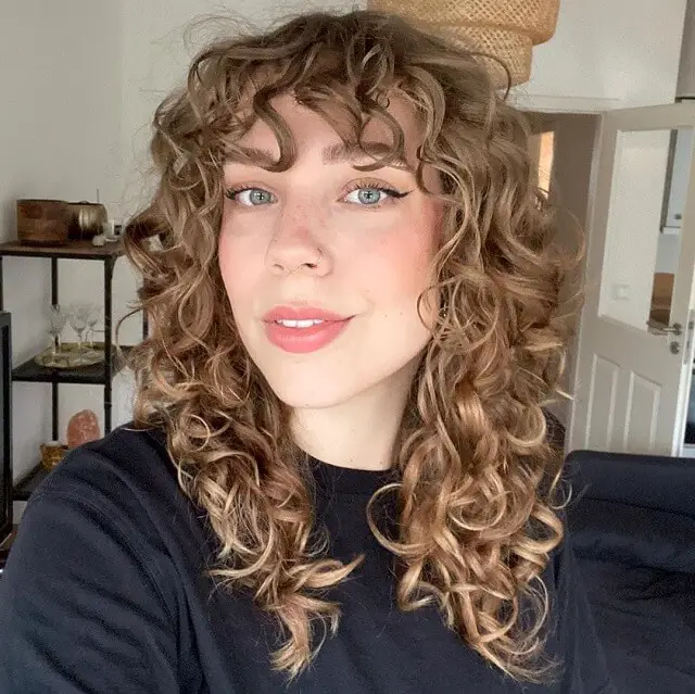 haircuts for thin curly hair with bangs