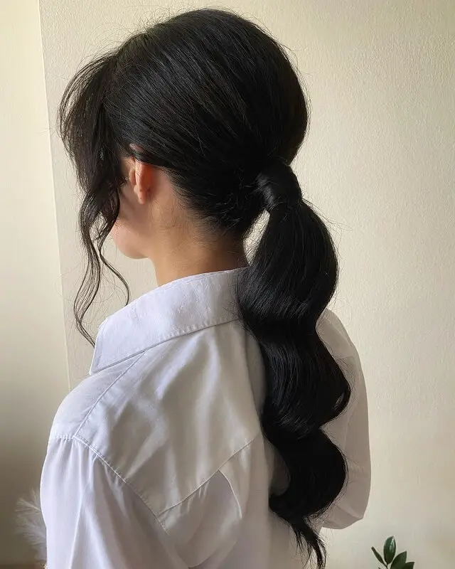 low wavy ponytail 