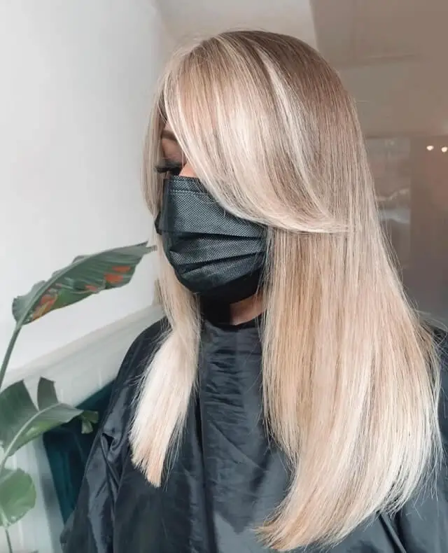 medium length blonde hair with bangs