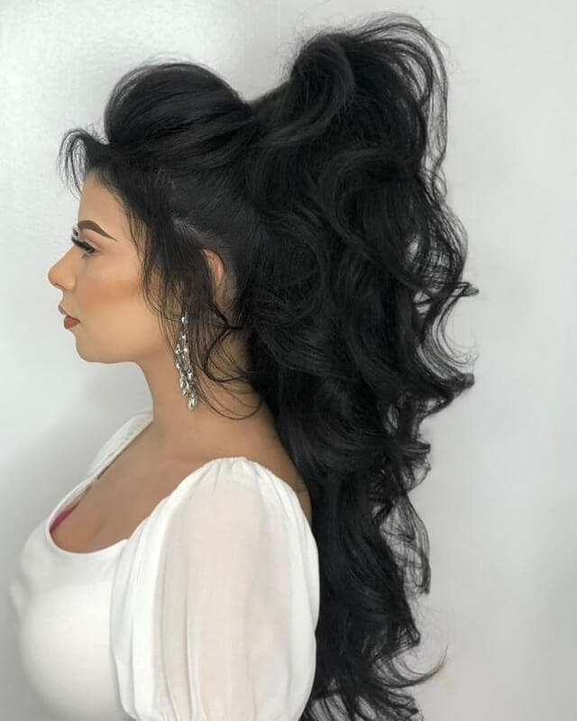 messy half up half down ponytail 