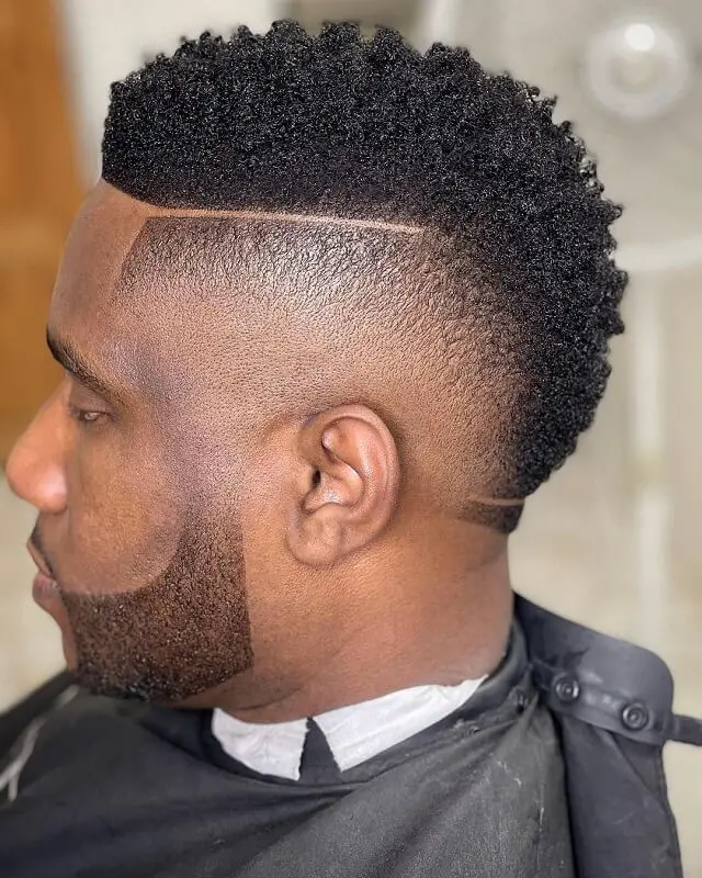 Mohawk Fade Haircut In A Pompadour Style