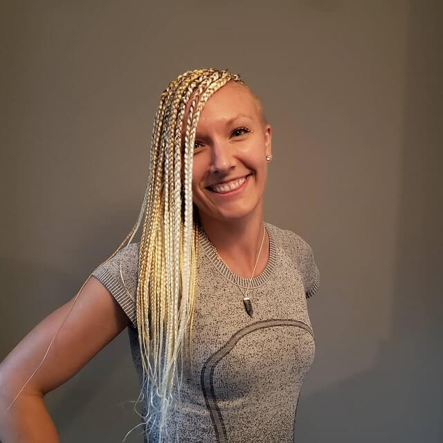 blonde braids with shaved sides