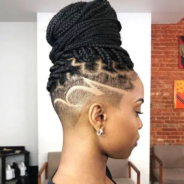 shaved sides with braids on top