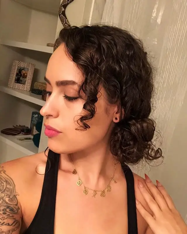 side bun curly hair