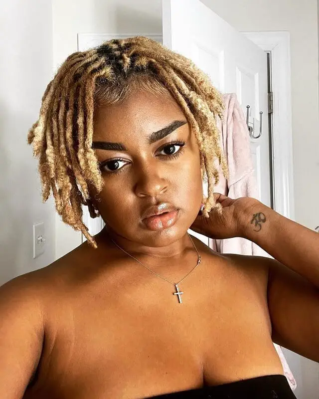 blonde dreads on dark skin