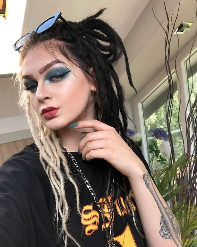 half blonde half black dreads 