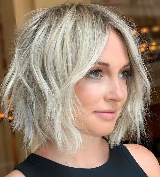  low maintenance short shaggy haircut for round faces 