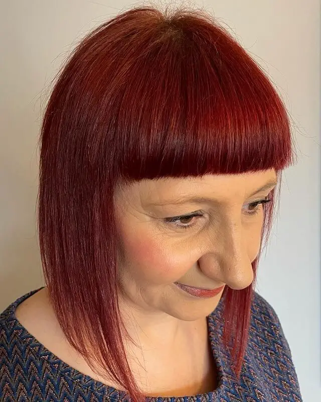 red hair with bangs for women over 50