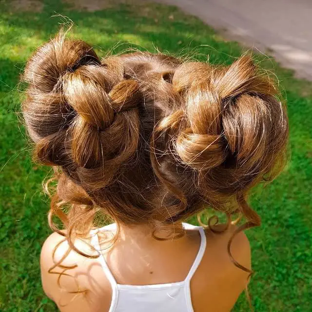 twisted two bun hairstyle 