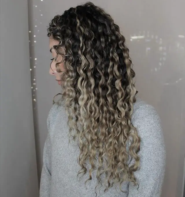 ash blonde balayage curly hair