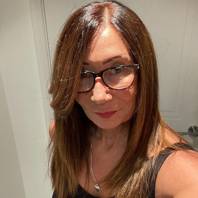 brown hair color for over 50 with glasses