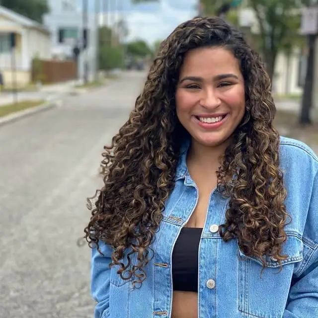 caramel balayage on dark curly hair 