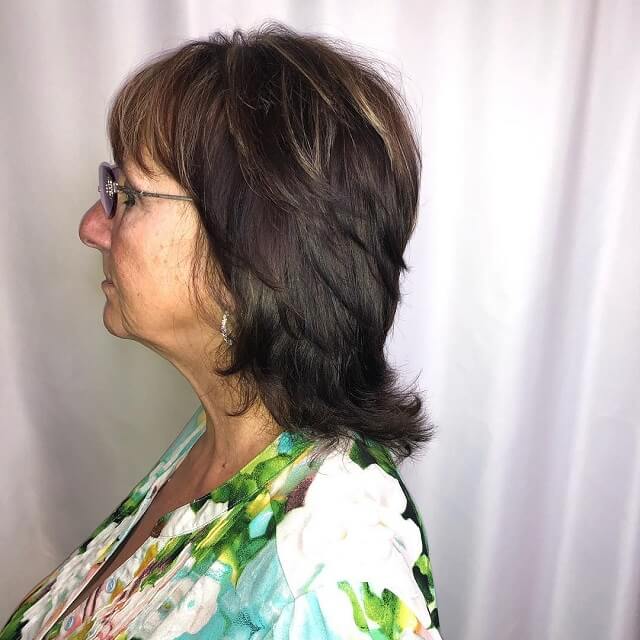 medium length layered hairstyles for over 50 with glasses