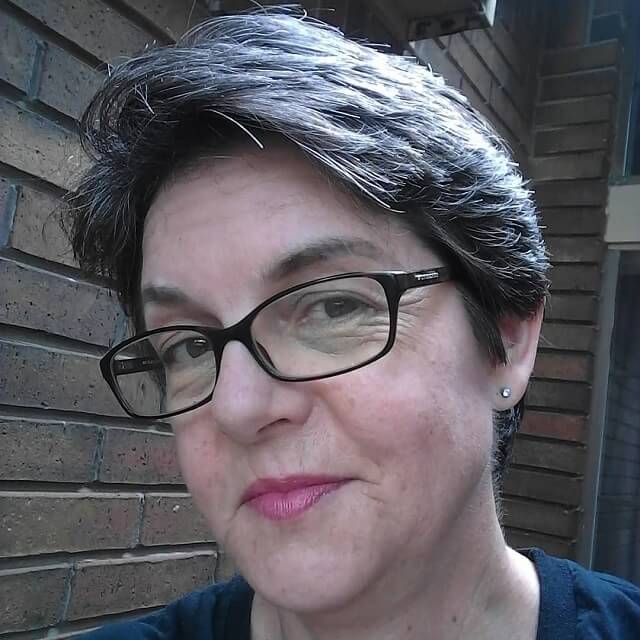 pixie hairstyles for over 50 with glasses