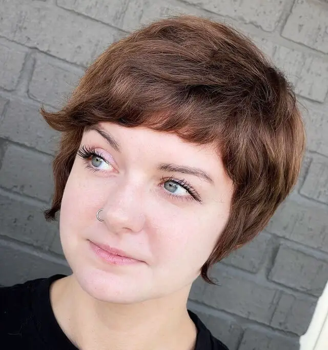 round face pixie cut with bangs