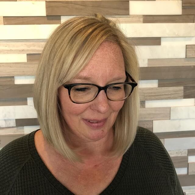 shoulder length hairstyles for over 50 with glasses