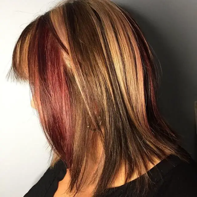  Crimson red hair with blonde highlights 