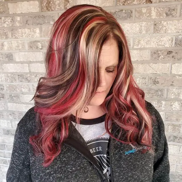 blonde hair with bright red highlights