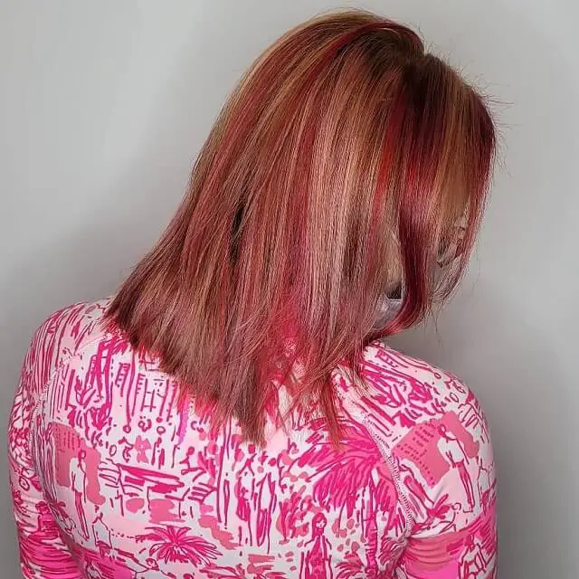 blonde hair with strawberry red highlights