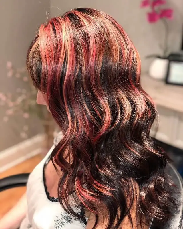 long black hair with red and blonde highlights 