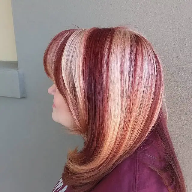 medium length blonde hair with red highlights  