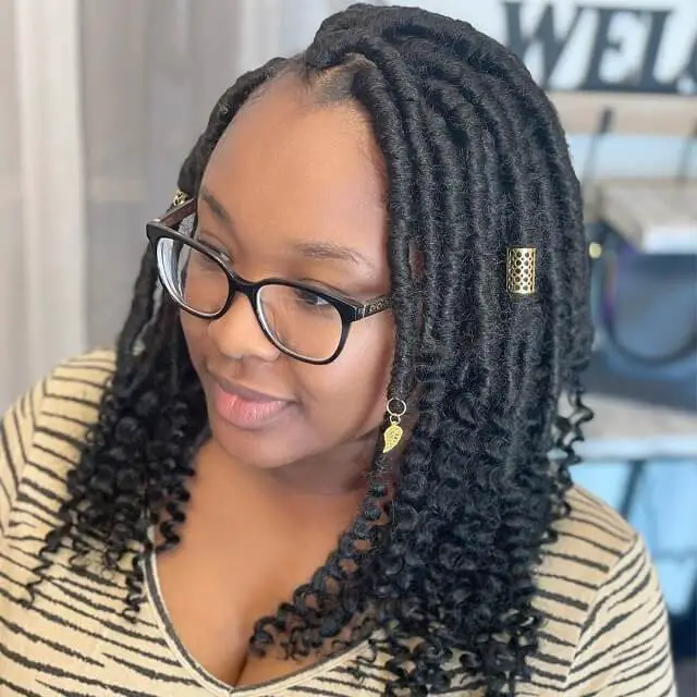  short faux locs with curly ends