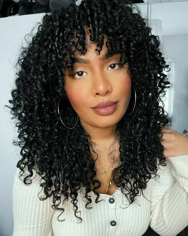 black curly Hair with Curtain Bangs
