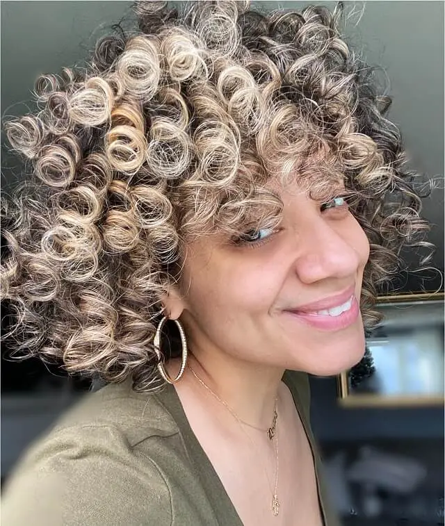 Round Curly Blonde Highlights