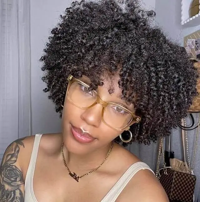 curly hair with bangs for black women