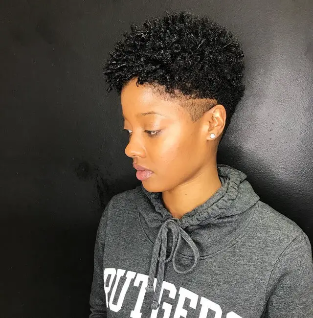 curly hair with shaved sides for black women