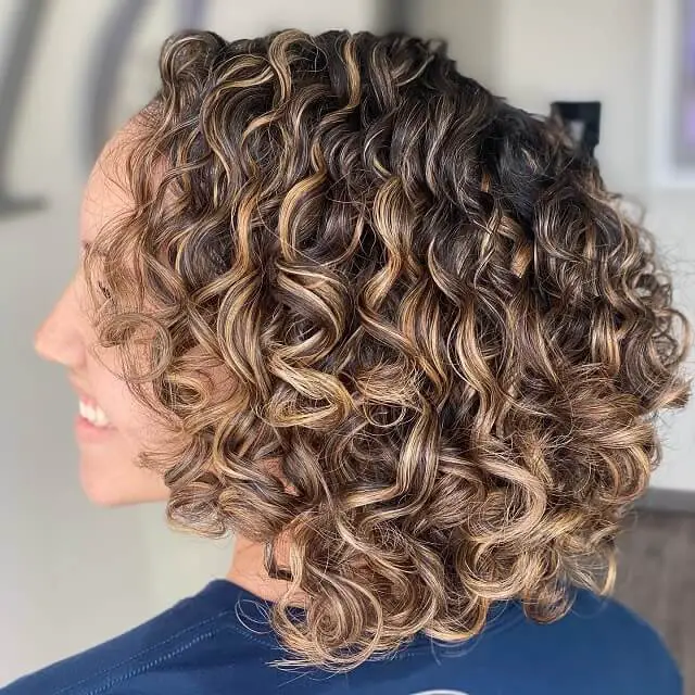 short curly hair with highlights