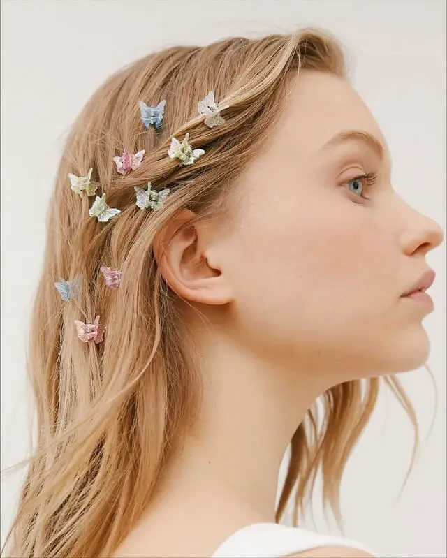 90s butterfly clip hairstyle